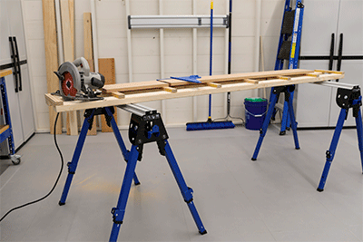 A custom crosscut support spans across two Kreg Track Horses
