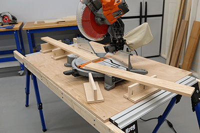 A miter saw with outfeed support for crosscutting long boards