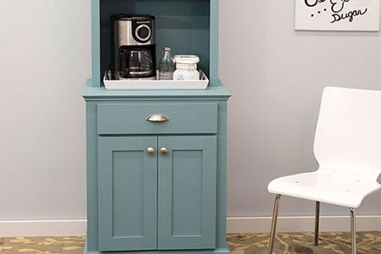 classic stepback cupboard set up as a coffee bar