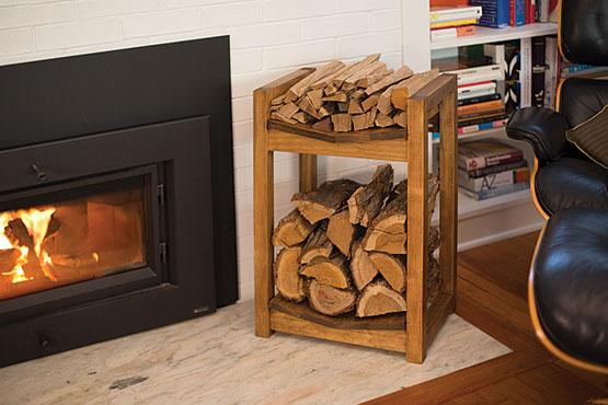 DIY rack for holding firewood by a fireplace