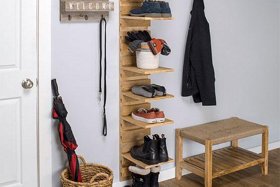 wall mounted shoe and boot organizer in entryway