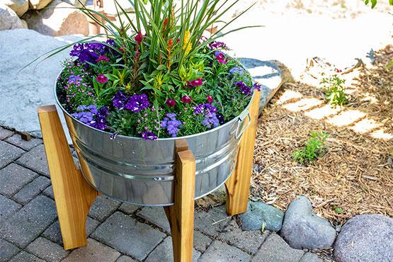 Raised garden planter with flowers