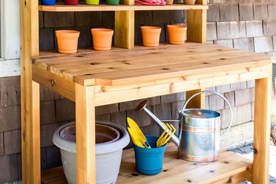 potting bench DIY woodworking project with garden supplies