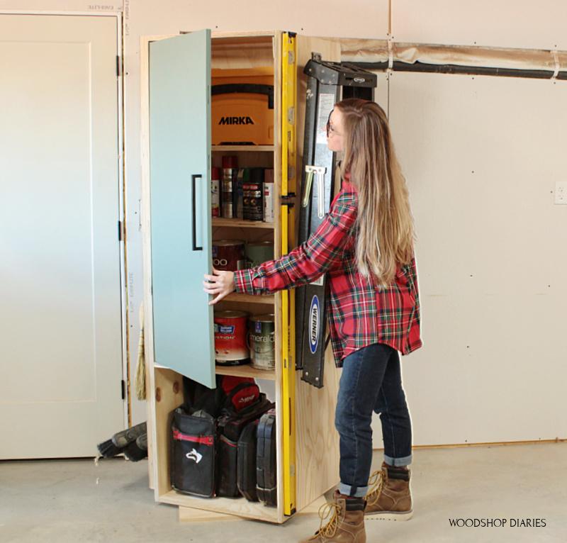 shara-opening-door-of-garage-storage-cabinet-small