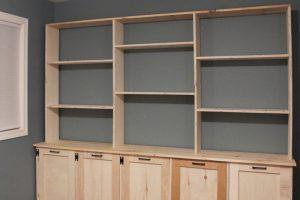 Shelving Unit with Storage and Tilt-Out Laundry