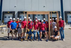 Kreg Tool employees participate in a Habitat for Humanity build